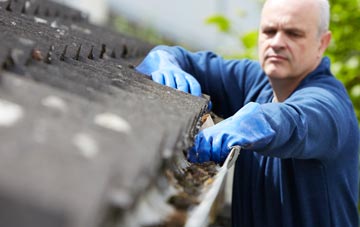 cleaning and inspecting Luss roofs